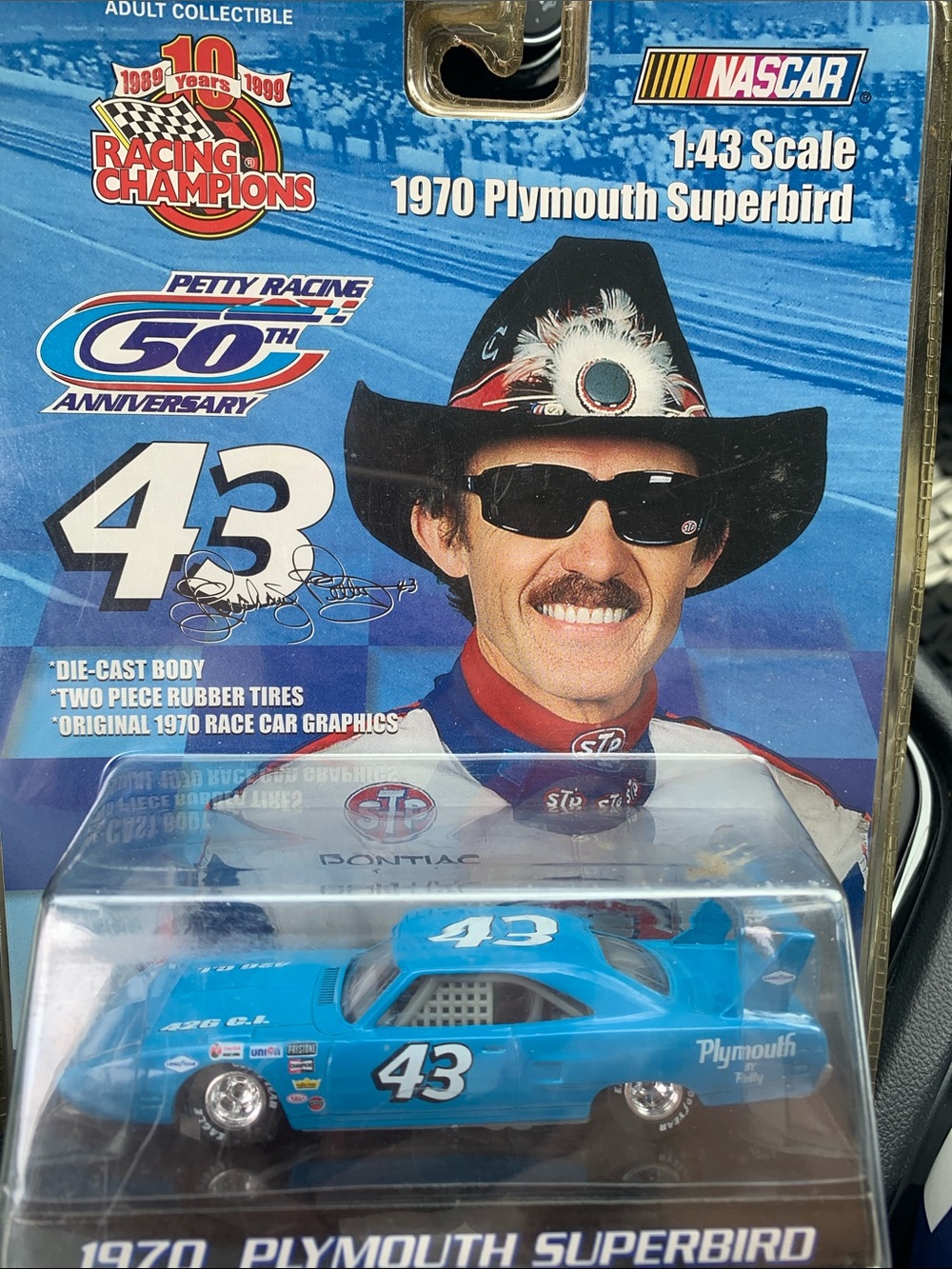 collectible is a 1999 Racing Champions 1:43 scale die-cast